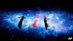 Kate Miller-Heidke of Australia performs during a rehearsal for the 2019 Eurovision Song Contest in Tel Aviv, Israel, Monday May 13, 2019. (AP Photo/Sebastian Scheiner)
