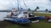 3 Sailors Rescued After Sharks Nearly Sink Their Boat in Coral Sea