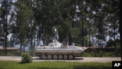 A UN Organization Stabilization Mission in DRC, MONUSCO, armored vehicle drives through Rutshuru, under control of M23 rebels, north of Goma, August 4, 2012.