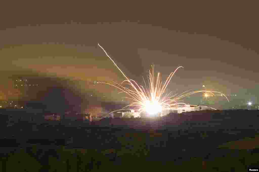 An Israeli rocket is fired into the northern Gaza Strip, July 17, 2014.