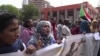 In this frame grab from video, Sudanese women rally on the streets of the capital, in Khartoum, Sudan, Sept. 12, 2019. 