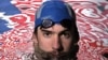 Olympic gold medalist Michael Phelps posing in the Belmont Plaza Olympic Pool in Long Beach, Calif. (Jan 2008 file photo)