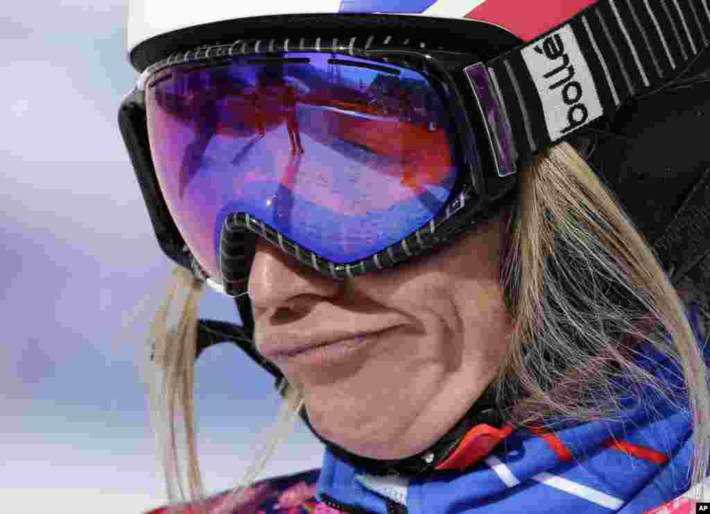 France's Deborah Anthonioz reacts after her seeding run during women's snowboard cross competition at the Rosa Khutor Extreme Park, at the 2014 Winter Olympics, Krasnaya Polyana, Russia, Feb. 16, 2014.