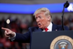 FILE - U.S. President Donald Trump delivers remarks during a campaign rally at the Giant Center in Hershey, Pennsylvania, Dec. 10, 2019.