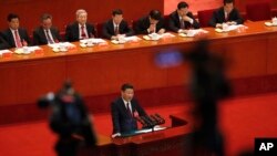 Chinese President Xi Jinping delivers a speech at the opening ceremony of the 19th Party Congress at the Great Hall of the People, Oct. 18, 2017.