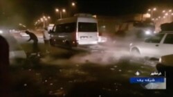 Protesters are seen on a street in Khorramshahr, Iran, in this Nov. 16, 2019, image from video aired by Iran's Islamic Republic of Iran Broadcasting state television channel.