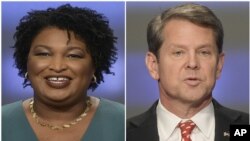 Candidatos a la gobernación de Georgia: Stacey Abrams, izquierda, y Brian Kemp, en Atlanta.