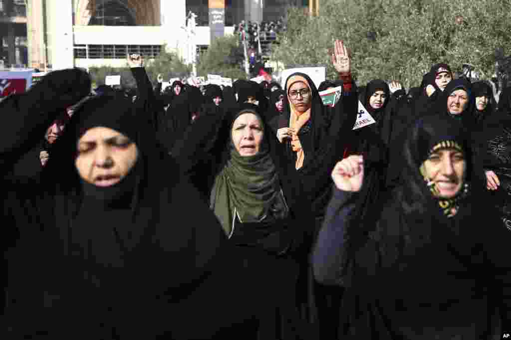 Iranian protesters chant slogans at a rally in Tehran, Iran, Dec. 30, 2017. Iranian hard-liners rallied Saturday to support the country's supreme leader and clerically overseen government as spontaneous protests sparked by anger over the country's ailing economy roiled major cities in the Islamic Republic.