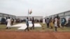 Penduduk setempat berkumpul di kamp penjaga perdamaian PBB menyusul serangan mematikan, di Dokura, wilayah Abyei, wilayah perbatasan Sudan-Sudan Selatan, dalam gambar diam yang diperoleh dari video media sosial yang dirilis 28 Januari 2024. (Video diperoleh Reuters) 