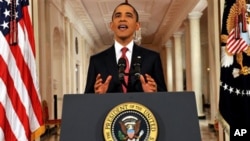 President Barack Obama addresses the nation from the East Room of the White House in Washington, Monday, July 25, 2011, on the approaching debt limit deadline.