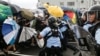 Riot Police Meet Hong Kong Protesters with Pepper Spray, Batons 