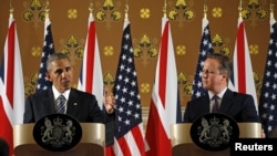 U.S. President Barack Obama and British Prime Minister David Cameron hold a news conference following their meeting at 10 Downing Street in London, Britain, April 22, 2016. 