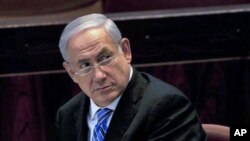 Israeli Prime Minister Benjamin Netanyahu is taking a tough line toward an emerging Palestinian government before his high-profile trip to Washington. In a clear message to the Hamas militant group, Benjamin Netanyahu told his parliament Monday that Israe
