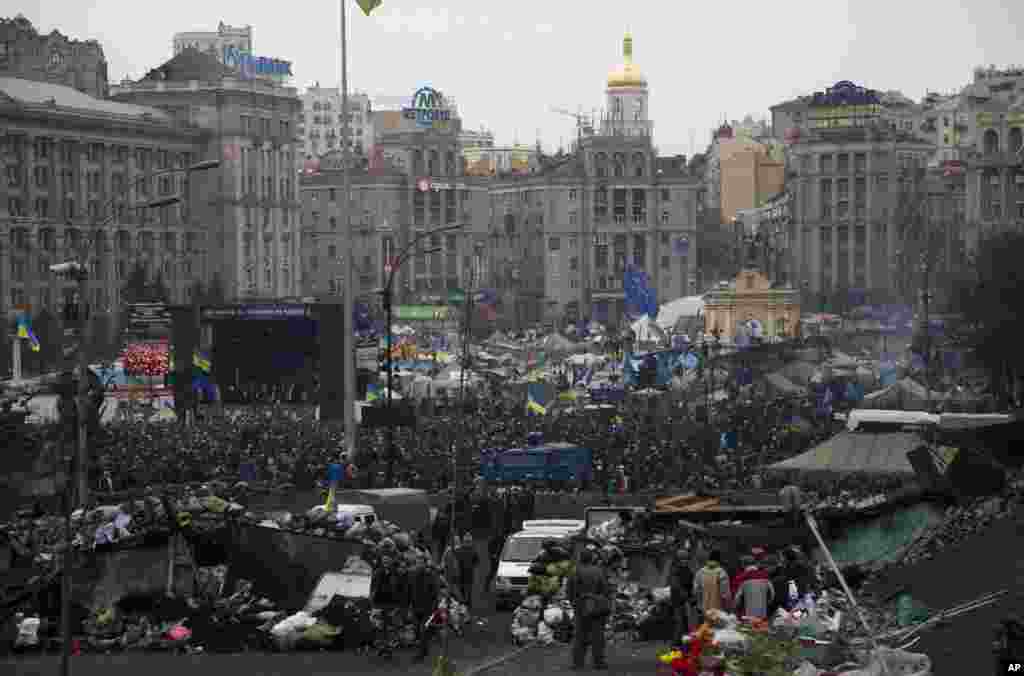Protesters gather in the Independence square in central Kyiv. Protesters claimed full control of the city following the signing of a Western-brokered peace deal aimed at ending the nation's three-month political crisis.