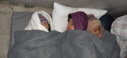 Children sleep in the streets after being released from quarantine in Izmir, Turkey, April 13, 2020. (Photo courtesy of refugees)