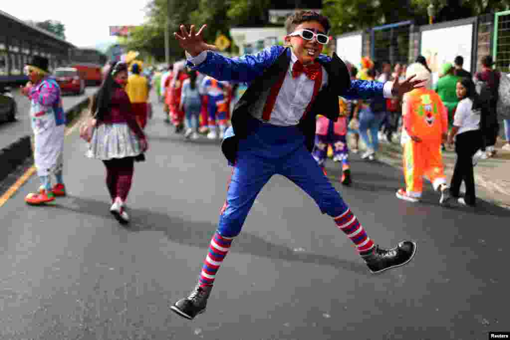 Salvadoran clowns participate in a parade during National Clown Day celebration in San Salvador, El Salvador, Dec. 4, 2024.