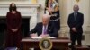 Biden to Reinstate COVID Travel Rules, Add South Africa