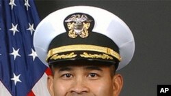 U.S. Navy Commander Michael Vannak Khem Misiewicz serves as a commanding officer of the guided-missile destroyer USS Mustin.