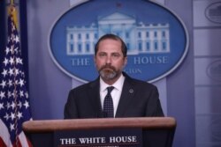FILE - U.S. Secretary of Health and Human Services Alex Azar speaks to reporters about Trump administration efforts in regard to the corona virus outbreak in China, during a news briefing at the White House in Washington, Jan. 31, 2020.