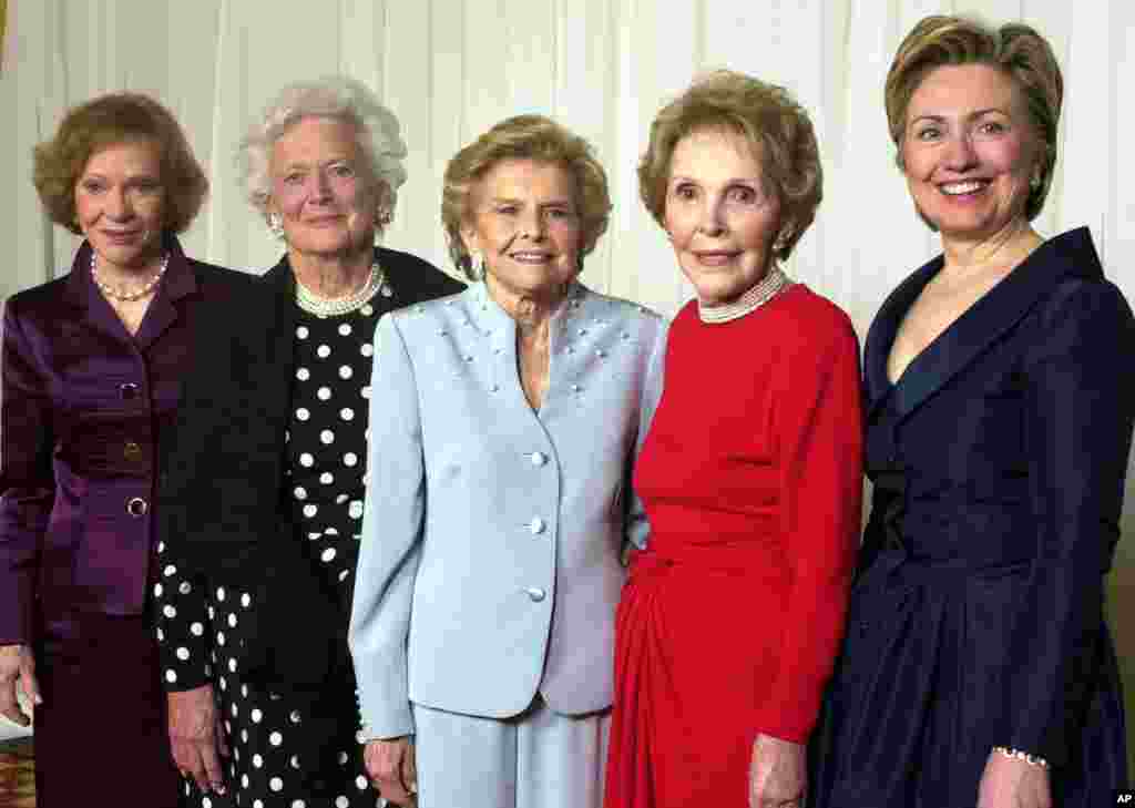 FILE - In this Jan. 17, 2003 file photo, former first ladies get together for a group photo at a gala 20th anniversary fundraising event saluting Betty Ford and the Betty Ford Center in Indian Wells, Calif.