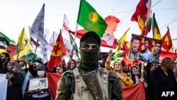 File - Syrian Kurds demonstrate, June 10, 2021, in the northeastern Syrian city of Qamishli against the Turkish offensive on Kurdistan Workers' Party (PKK) areas in northern Iraq.