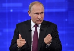 Russian President Vladimir Putin speaks during an annual nationwide televised phone-in show in Moscow, June 20, 2019.