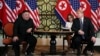 FILE - U.S. President Donald Trump looks toward North Korean leader Kim Jong Un during the one-on-one bilateral meeting at the second North Korea-U.S. summit in Hanoi, Vietnam, Feb. 28, 2019. 