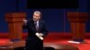 Moderators Hold the Center of Debate Stage 
