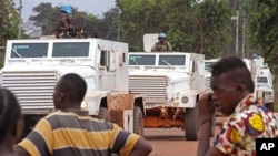 FILE - U.N. peacekeeping soldiers on patrol in the city of Bangui, Central African Republic, Sept. 30, 2015. Pope Francis is scheduled to arrive in the country Nov. 29, the final stop on his Africa tour.
