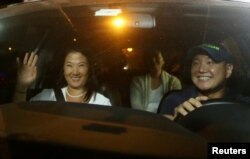 Keiko, Sachi and Hiro Fujimori, daughters and son of former President Alberto Fujimori arrive to visit their father after Peruvian President Pedro Pablo Kuczynski pardoned him, at Centenario hospital in Lima, Peru, Dec. 24, 2017. The elder Fujimori was serving a 25-year prison sentence.