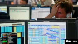 Traders from BGC, a global brokerage company in London