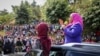 Tanzanian Vice President Samia Suluhu Hassan, right, speaks during a tour of the Tanga region of Tanzania, March 16, 2021.