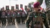 Arhiv - Članovi iračke šiitske militantne grupe prisustvuju sahrani članova grupe ubijenih u vazdušnom napadu SAD, u Bagdadu, 4. februara 2024. U februaru su SAD pogodile više od 85 meta u Iraku i Siriji koje su povezane sa iranskom Islamskom revolucionarnom gardom korpusa.