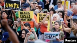 People protest in support of Philando Castile during a rally on the capitol steps after a jury found St. Anthony Police Department officer Jeronimo Yanez not guilty of second-degree manslaughter in the death of Castile, in St. Paul, Minnesota, June 16, 20