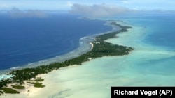 FILE - In this March 30, 2004, file photo, Tarawa atoll, Kiribati, is seen in an aerial view. 