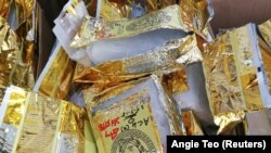  Bea Cukai Malaysia memamerkan 1187 kg Metamfetamin senilai 71 juta ringgit yang disita selama konferensi pers di Nilai, Malaysia 28 Mei 2018. (Foto: REUTERS/Angie Teo)