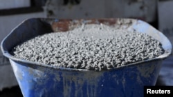 Freshly poured concrete made with captured carbon dioxide is seen in a wheelbarrow in San Jose, California, U.S. February 1, 2023. REUTERS/Nathan Frandino