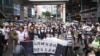 香港警方拘捕8名民主派人士涉今年7/1游行 学者批冷战时代人质外交
