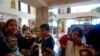 Greek Hoteliers Offer Respite to Weary Migrants