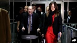 arvey Weinstein, accompanied by defense attorney Donna Rotunno, leaves a Manhattan courtroom during his rape trial in New York, Feb. 7, 2020.