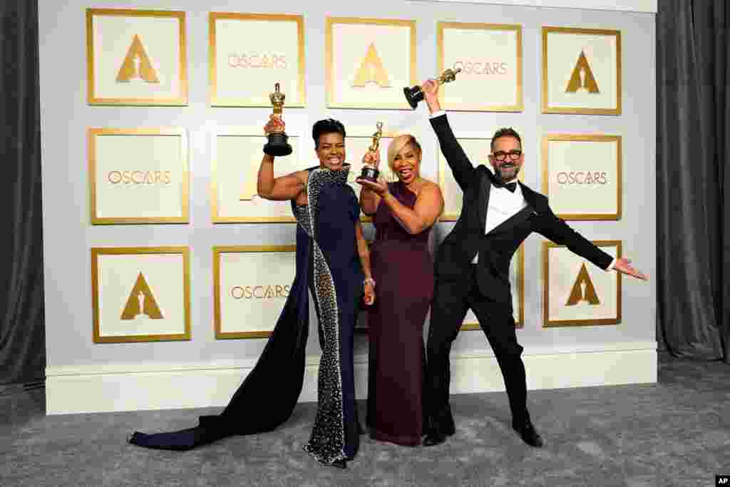 Mia Neal, from left, Jamika Wilson and Sergio Lopez-Rivera, winners of the award for best makeup and hairstyling for "Ma Rainey's Black Bottom," pose in the press room at the Oscars on Sunday, April 25, 2021, at Union Station in Los Angeles. (AP…