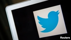 FILE - A portrait of the Twitter logo in Ventura, California. 