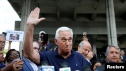 FILE - Roger Stone speaks after his appearance at Federal Court in Fort Lauderdale, Fla., Jan. 25, 2019.