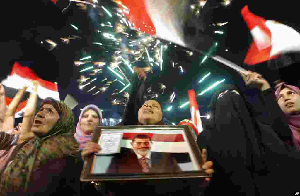 Supporters of Egypt's Islamist President Mohamed Morsi attend a rally in Nasser City, Cairo, Egypt, July 1, 2013.