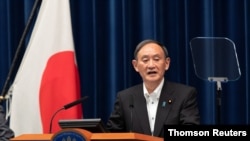 Japanese Prime Minister Suga holds a news conference in Tokyo, May 7, 2021.