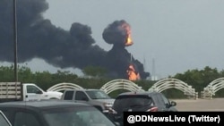 佛罗里达州卡纳维尔角太空探索科技公司（SpaceX）发射场星期四发生爆炸，浓烟升起在发射场上空。（2016年9月1日）