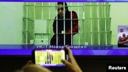 US basketball player Brittney Griner appears on a screen via video link from the detention centre during a court hearing to consider an appeal against her prison sentence, in Krasnogorsk, Moscow Region, Oct. 25, 2022. 