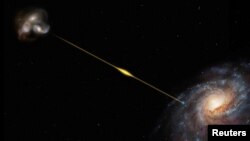 This artist's impression, not to scale, illustrates the path of a fast radio burst from the distant galaxy where it originated all the way to Earth in this handout picture obtained on October 20, 2023. (ESO/M. Kornmesser/Handout via REUTERS)