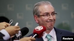 President of Brazil's Chamber of Deputies Eduardo Cunha speaks during a news conference at the Chamber of Deputies in Brasilia, Brazil, Dec. 7, 2015. 