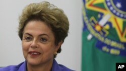 Brazil’s President Dilma Rousseff meets with women rural workers at Planalto Presidential Palace in Brasilia, Brazil, Aug. 6, 2015.